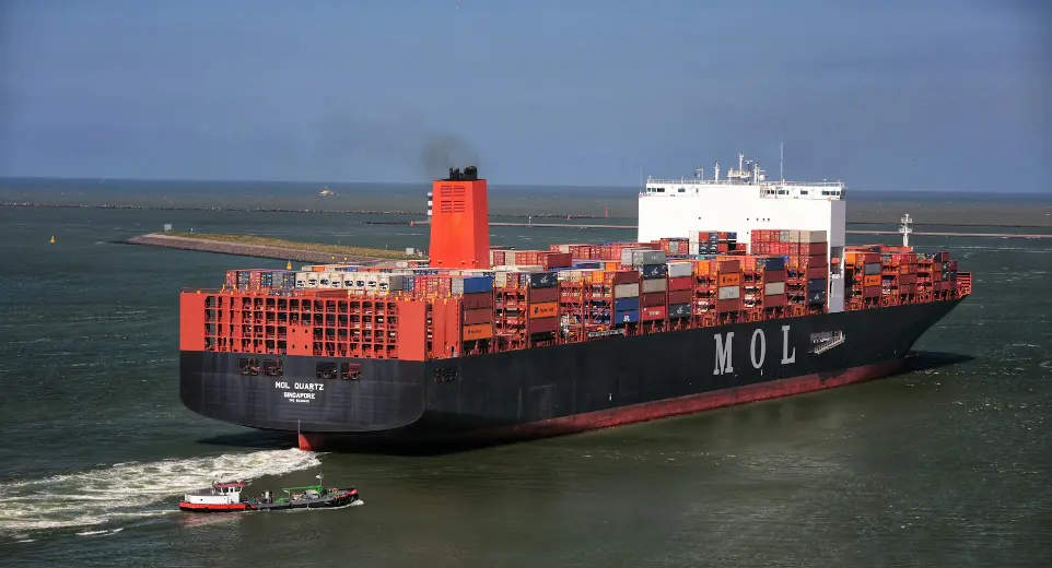 a large cargo ship sailing in the ocean